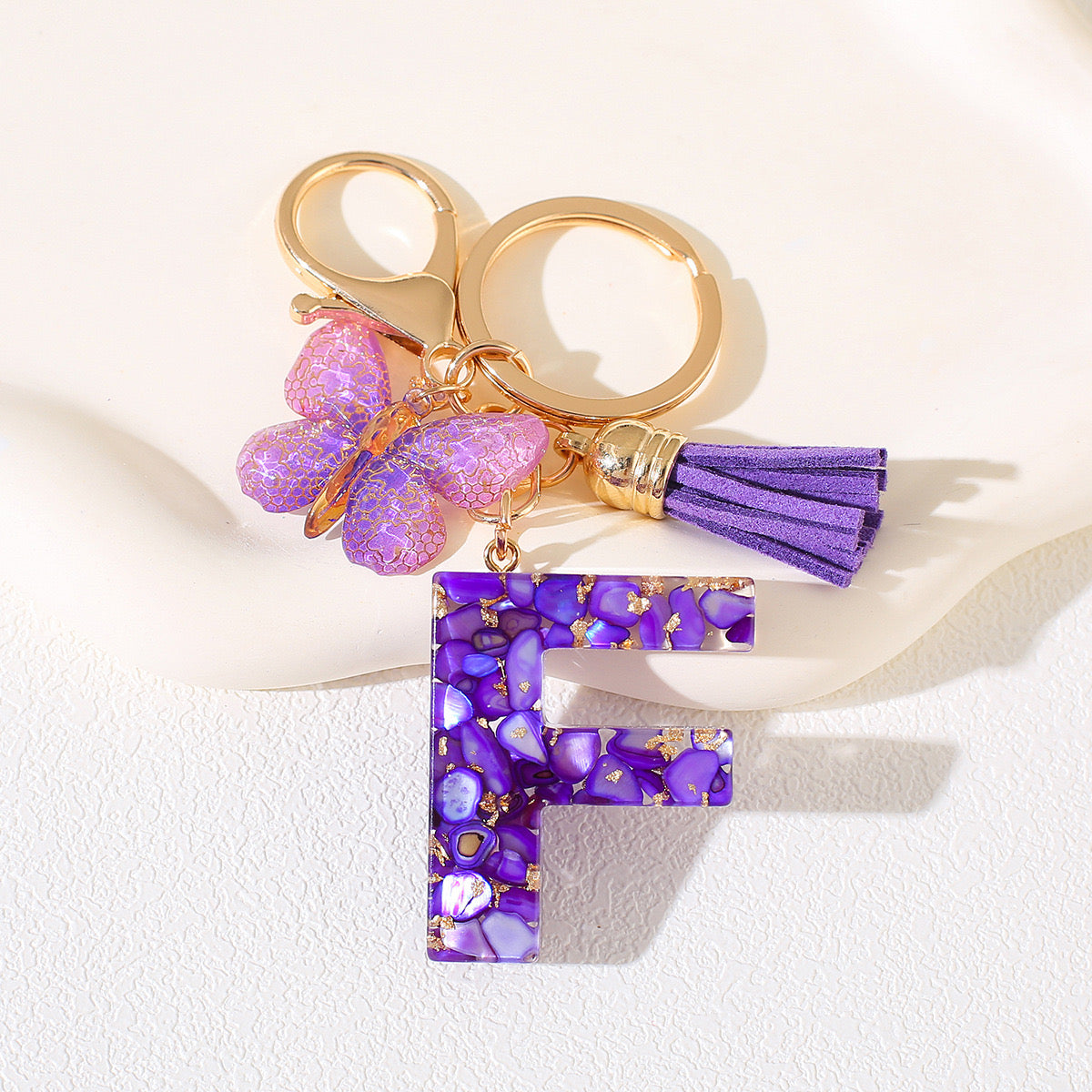 Glitter Letter Keychain – Purple Resin with Butterfly & Tassel