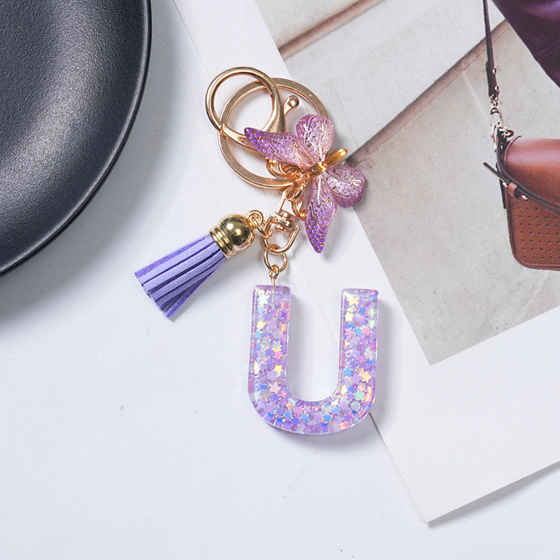 Purple Glitter Resin Initial Keychain – Butterfly & Tassel Charm Gift