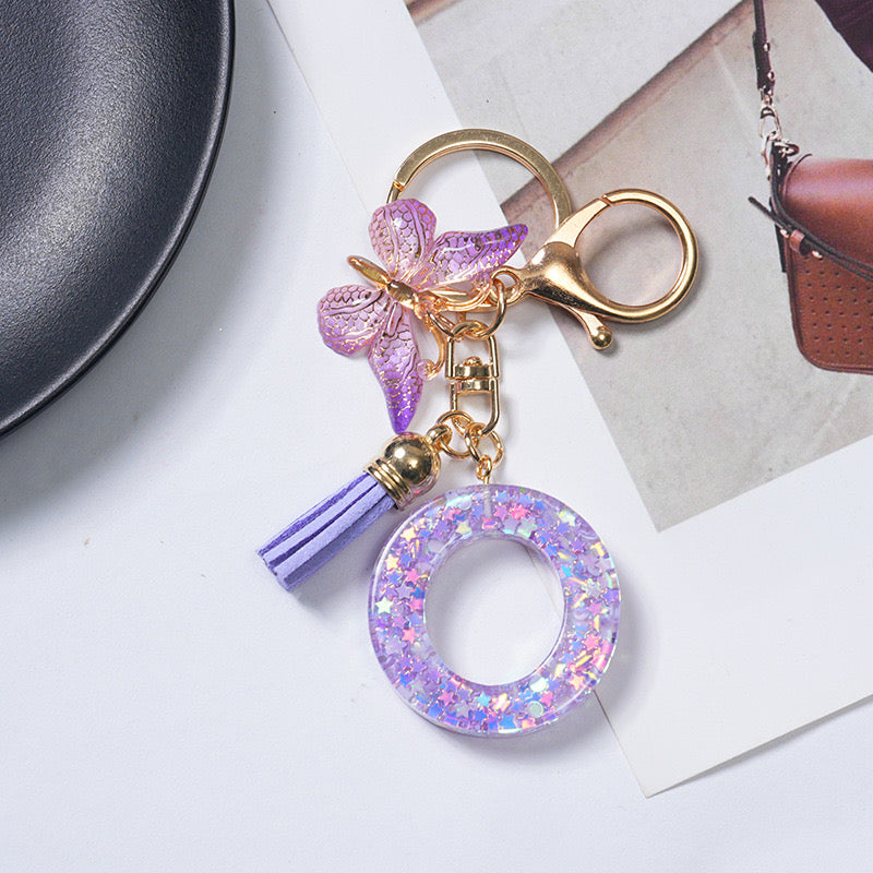 Purple Glitter Resin Initial Keychain – Butterfly & Tassel Charm Gift