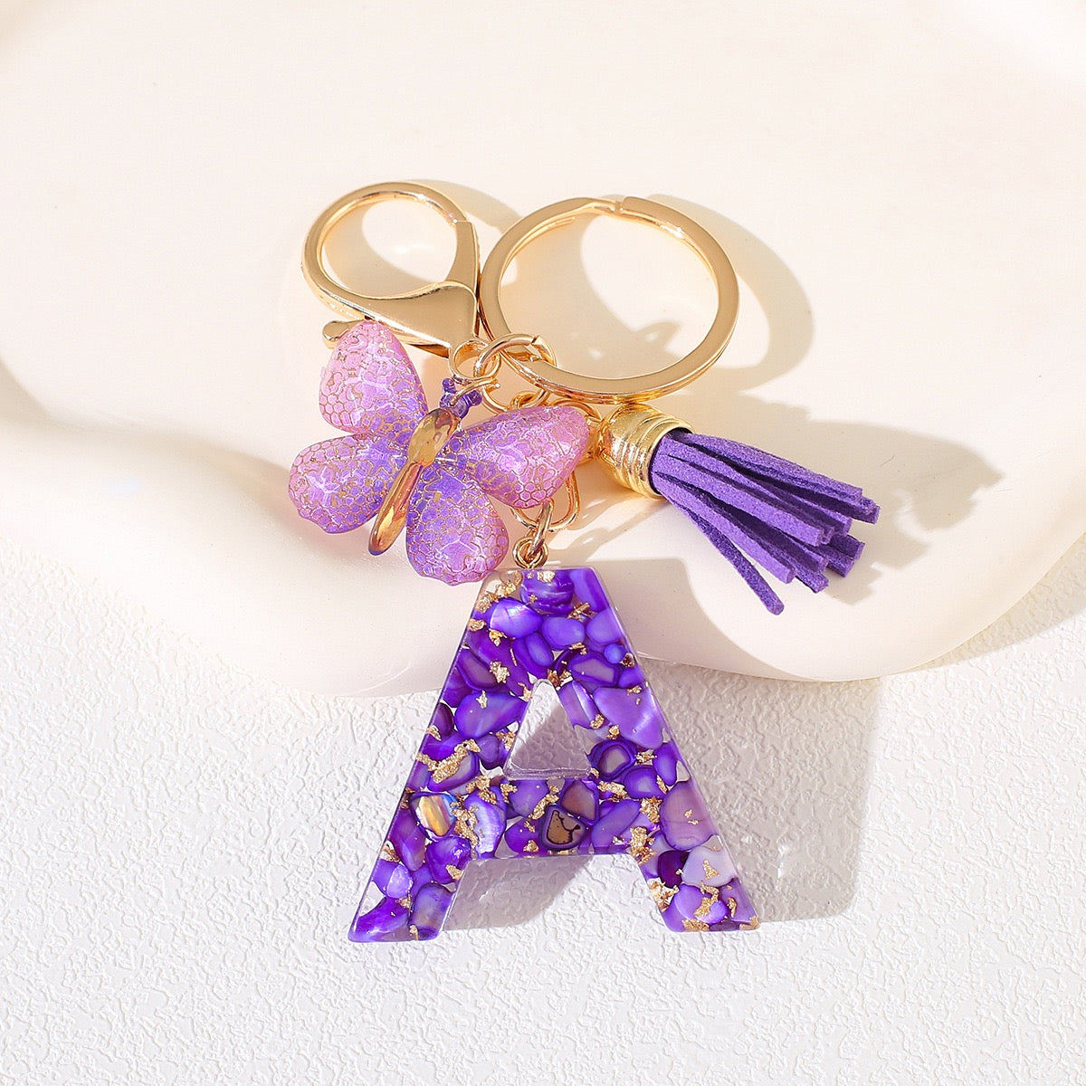 Glitter Letter Keychain – Purple Resin with Butterfly & Tassel