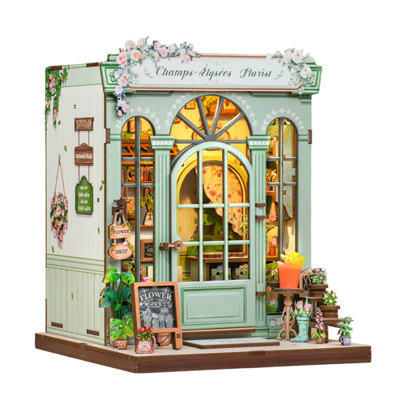 Champs-Élysées Florist DIY wooden book nook kit – pastel green miniature flower shop with floral details and romantic Parisian decor