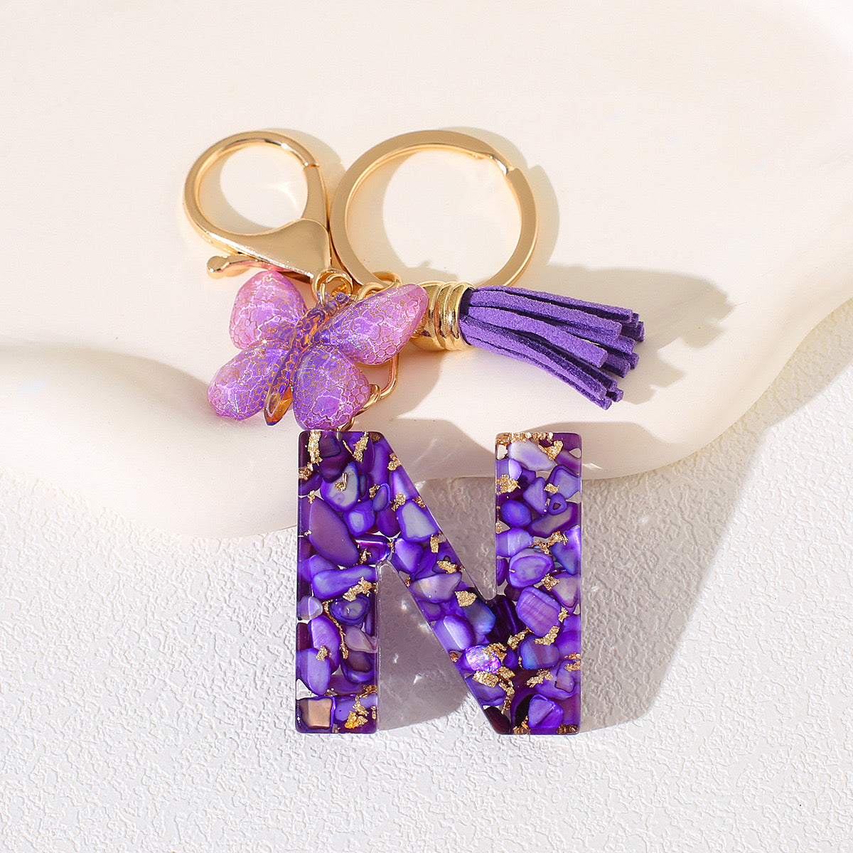 Glitter Letter Keychain – Purple Resin with Butterfly & Tassel