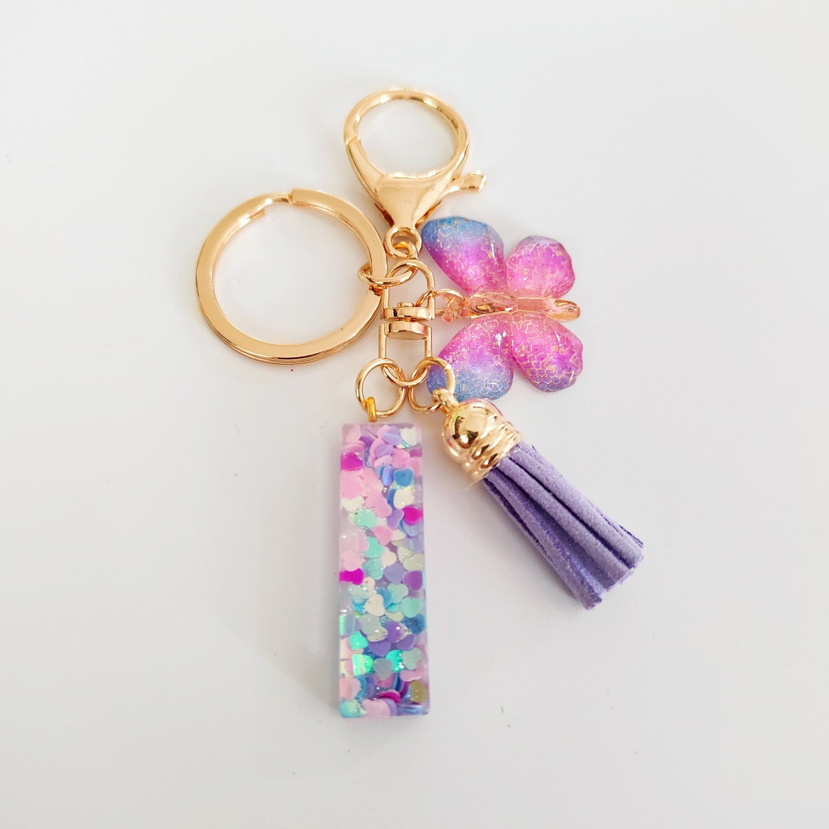 Glitter Resin Letter Keychain – Purple Tassel & Butterfly Charm