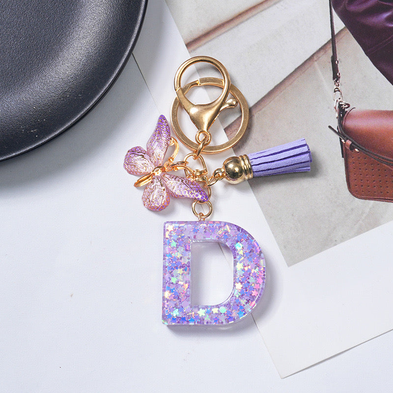 Purple Glitter Resin Initial Keychain – Butterfly & Tassel Charm Gift