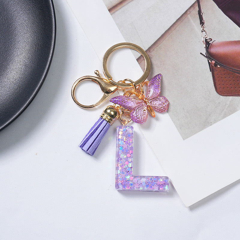 Purple Glitter Resin Initial Keychain – Butterfly & Tassel Charm Gift