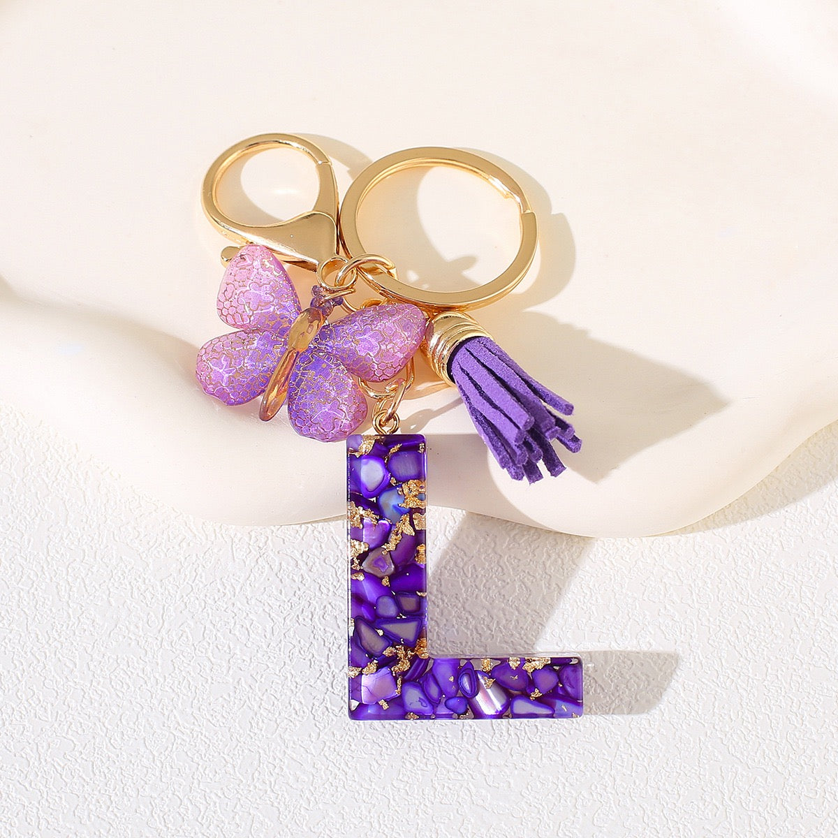 Glitter Letter Keychain – Purple Resin with Butterfly & Tassel