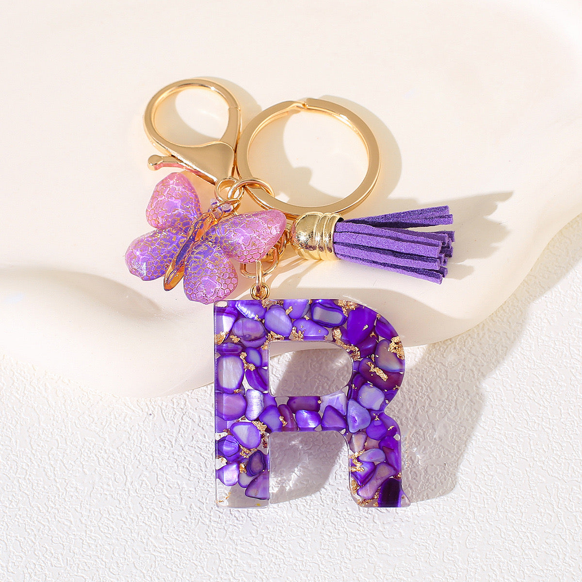 Glitter Letter Keychain – Purple Resin with Butterfly & Tassel