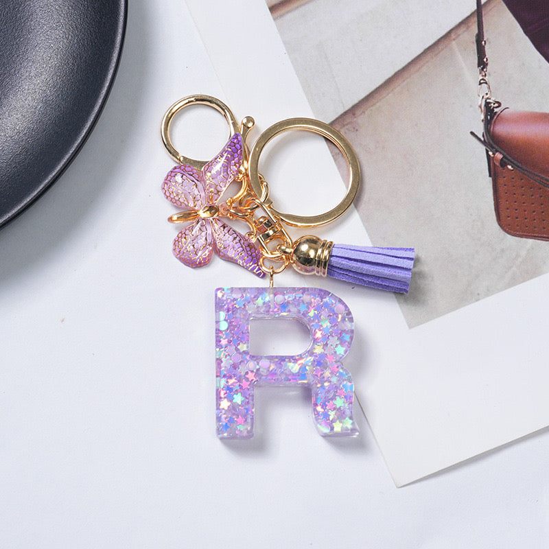 Purple Glitter Resin Initial Keychain – Butterfly & Tassel Charm Gift
