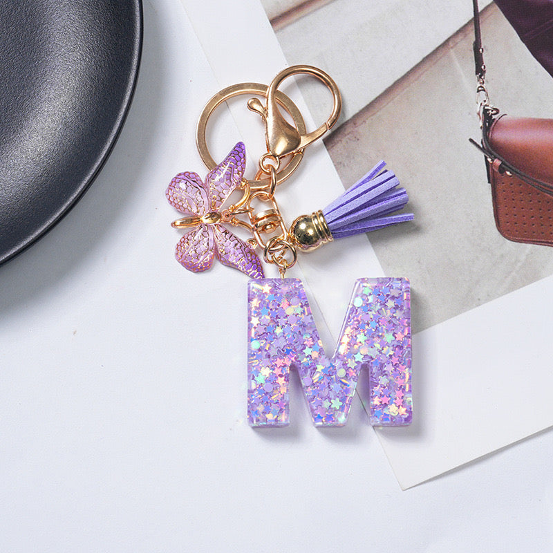Purple Glitter Resin Initial Keychain – Butterfly & Tassel Charm Gift