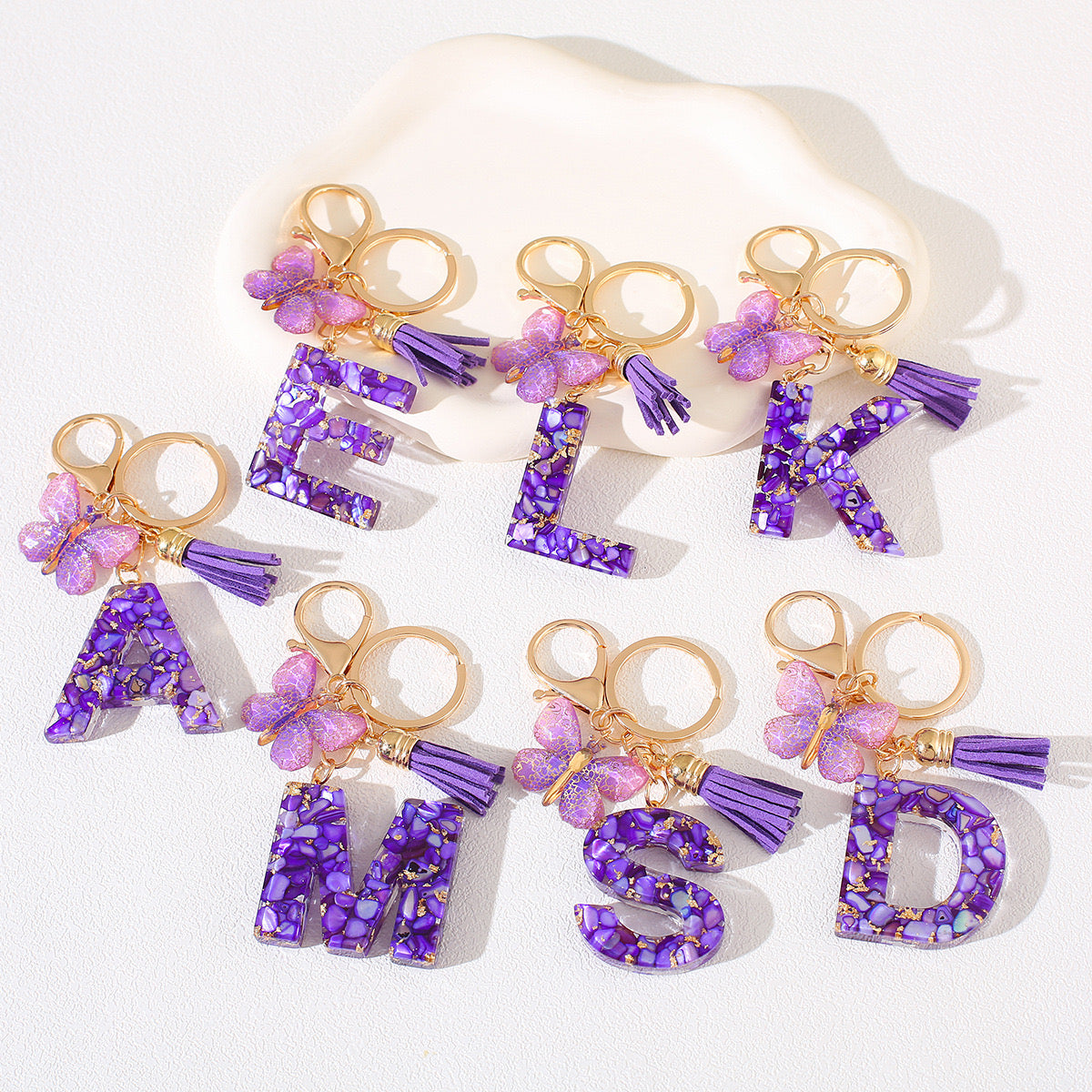 Glitter Letter Keychain – Purple Resin with Butterfly & Tassel