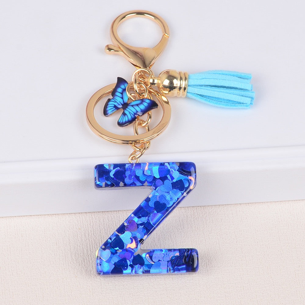 Blue Initial Letter Keychain with Butterfly & Tassel V Boutique Studio