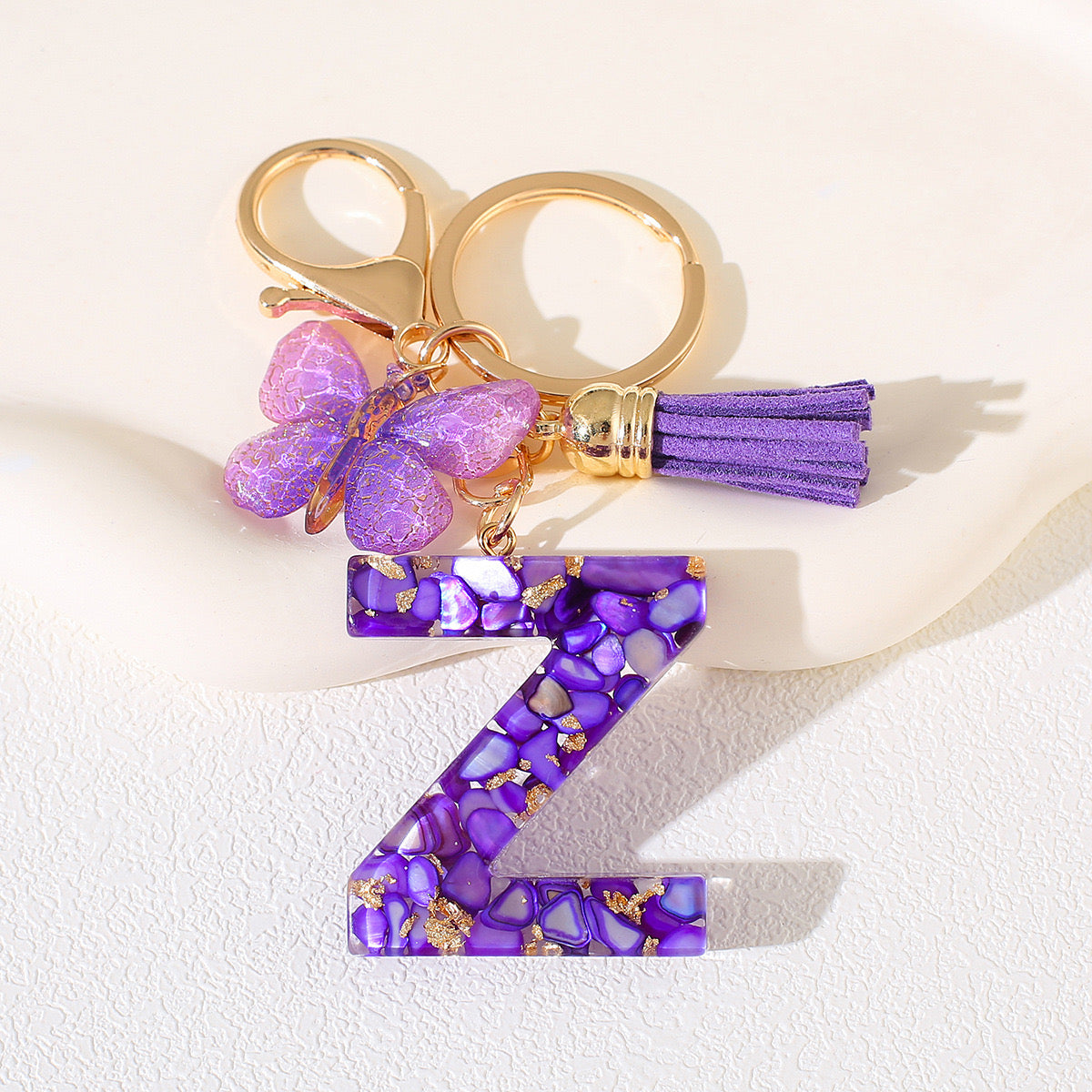 Glitter Letter Keychain – Purple Resin with Butterfly & Tassel V Boutique Studio