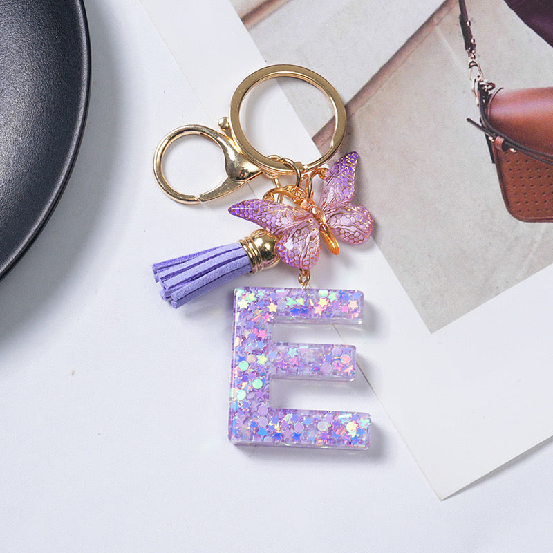 Purple Glitter Resin Initial Keychain – Butterfly & Tassel Charm Gift