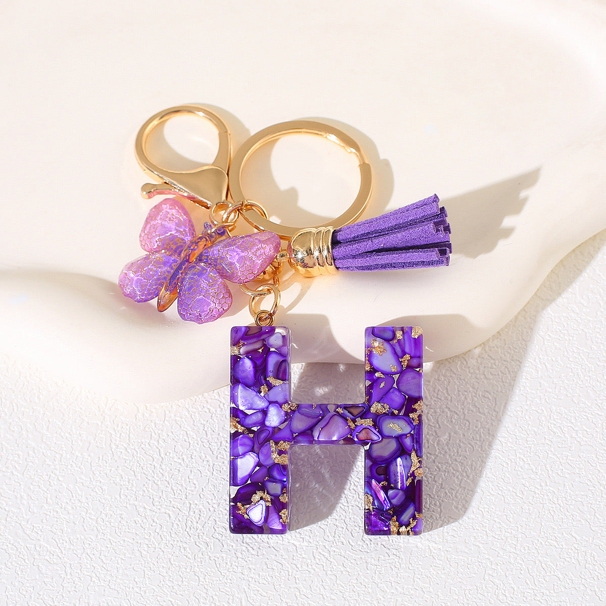 Glitter Letter Keychain – Purple Resin with Butterfly & Tassel