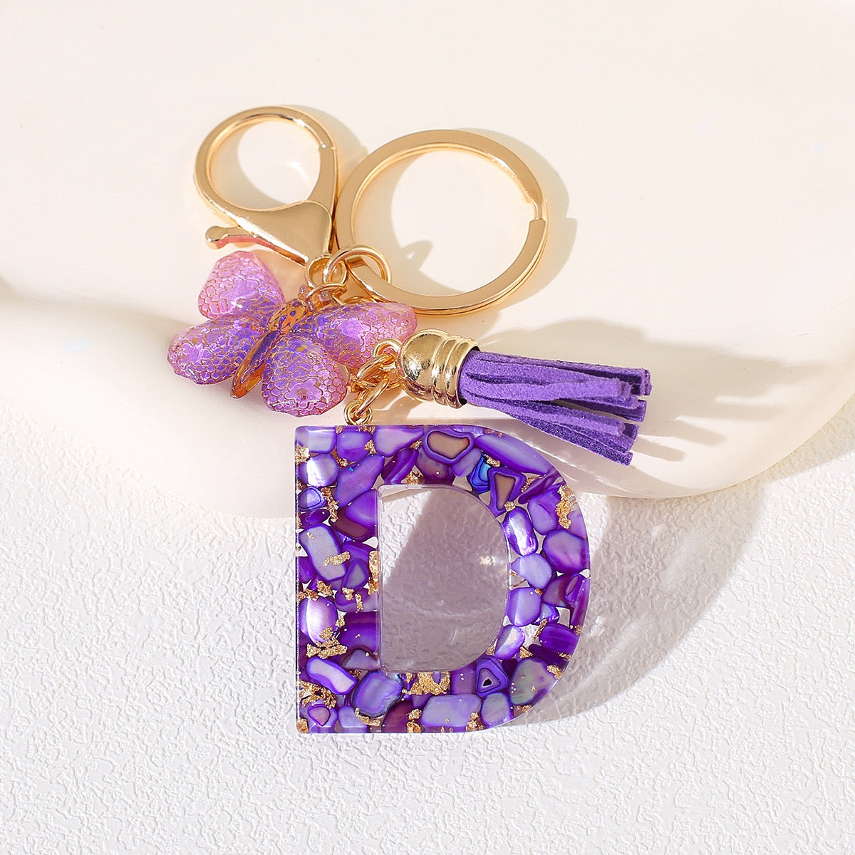Glitter Letter Keychain – Purple Resin with Butterfly & Tassel