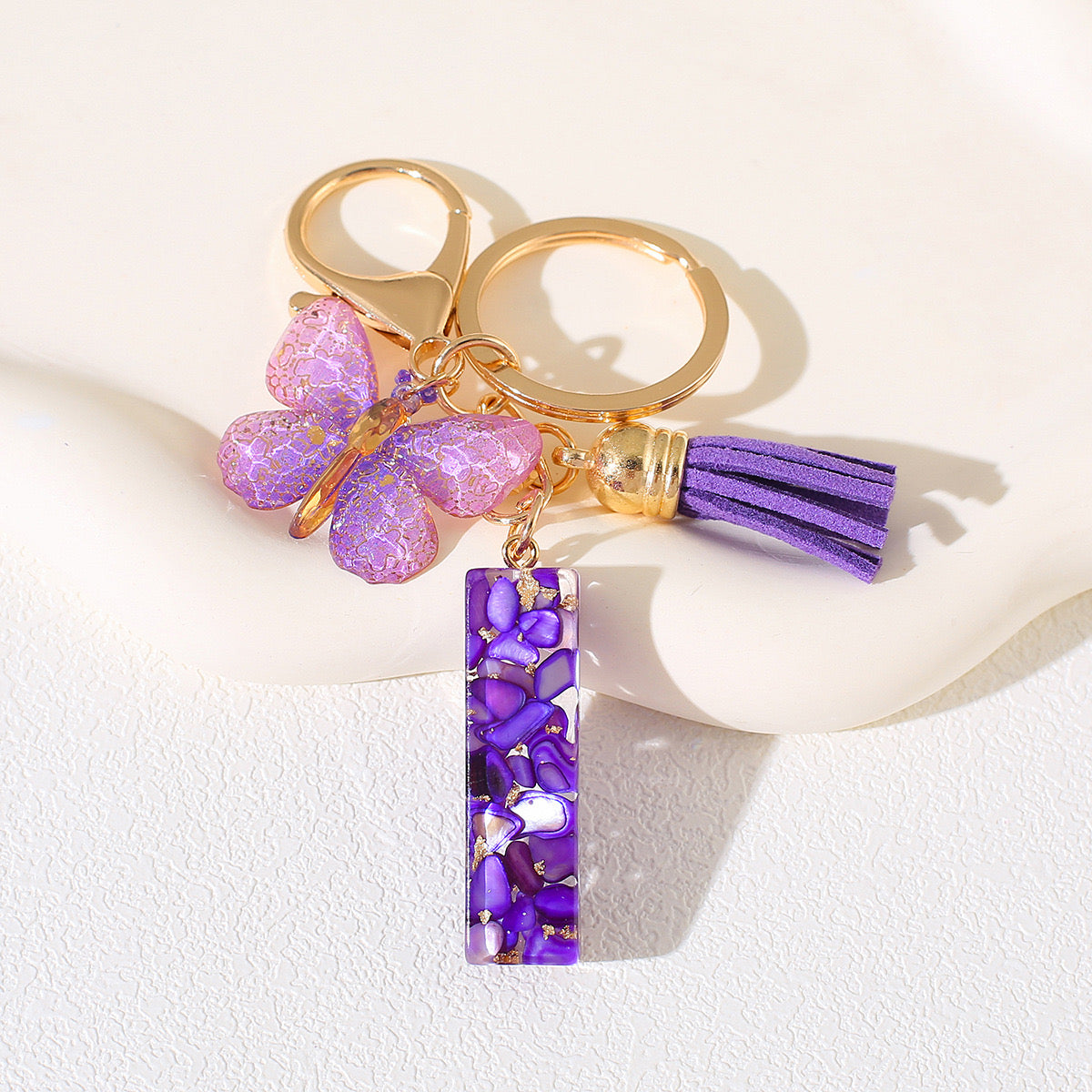 Glitter Letter Keychain – Purple Resin with Butterfly & Tassel