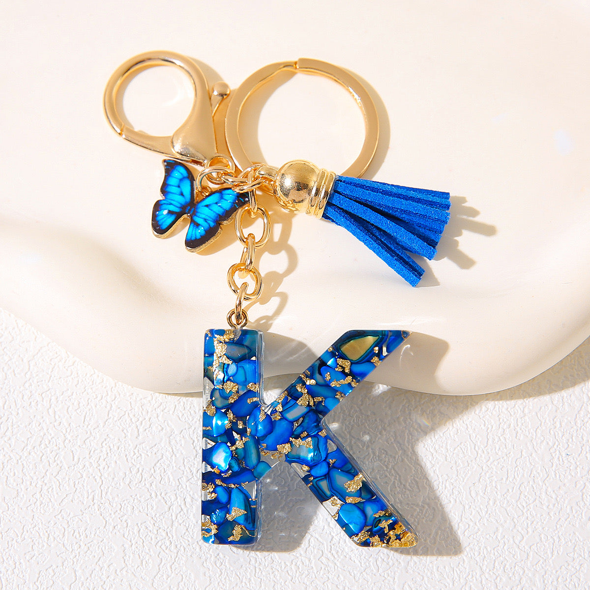 Blue Glitter Resin Initial Keychain – Butterfly & Tassel Charm