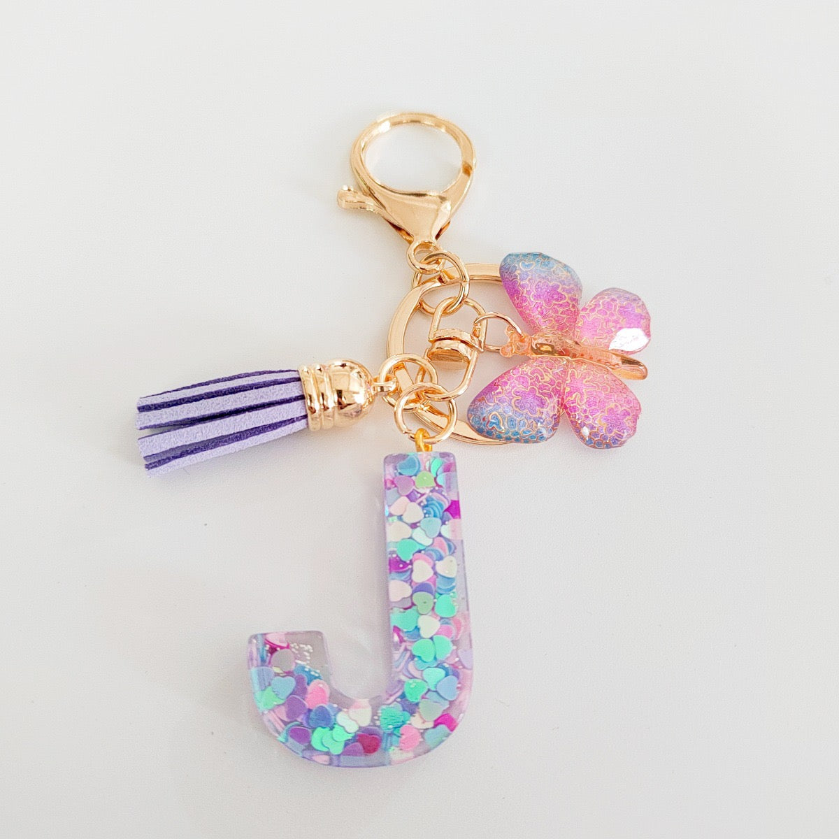 Glitter Resin Letter Keychain – Purple Tassel & Butterfly Charm