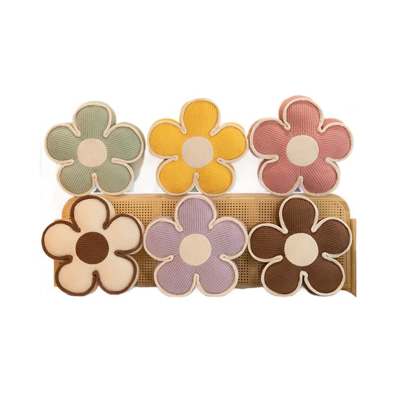 Cute flower-shaped throw pillows in pastel colors – daisy plush cushions for home decor or bedroom.