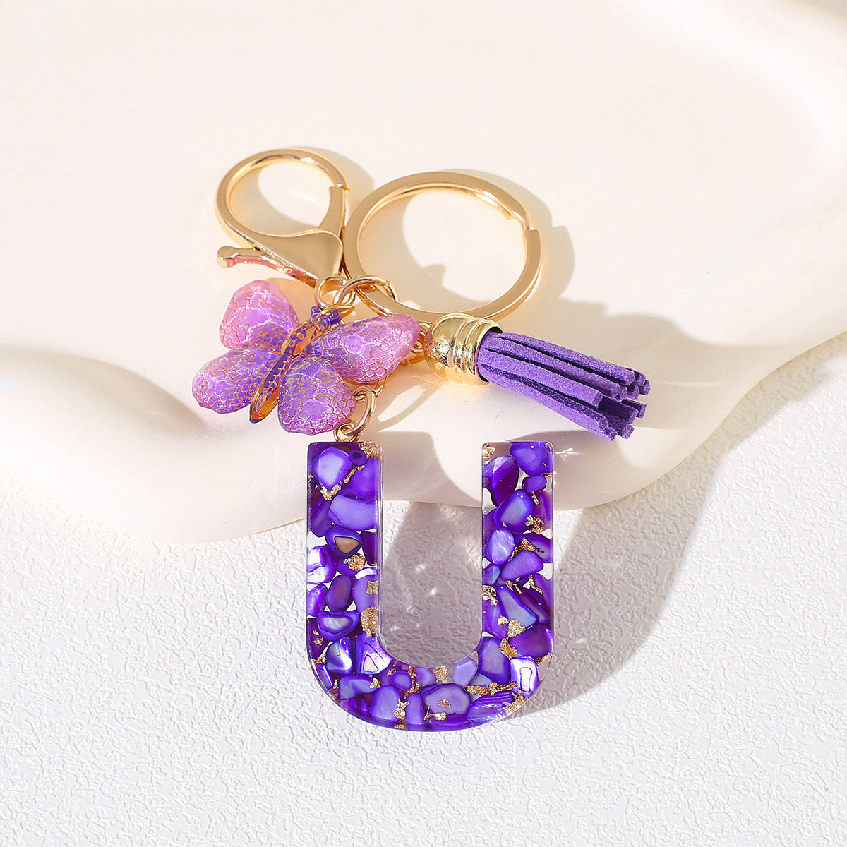 Glitter Letter Keychain – Purple Resin with Butterfly & Tassel