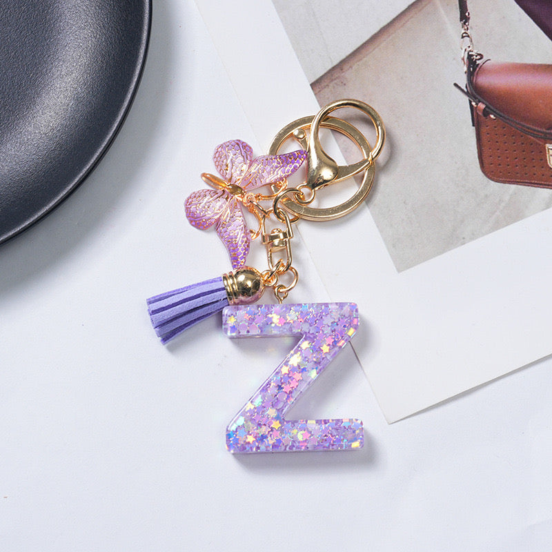 Purple Glitter Resin Initial Keychain – Butterfly & Tassel Charm Gift