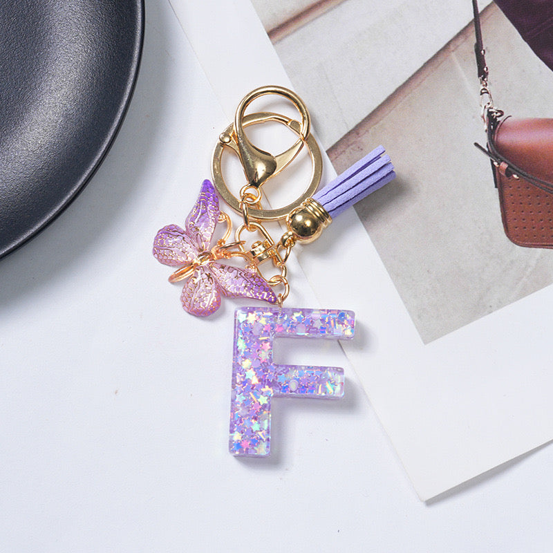 Purple Glitter Resin Initial Keychain – Butterfly & Tassel Charm Gift