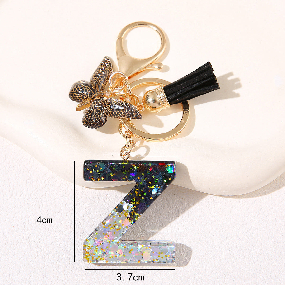 Black Glitter Resin Initial Keychain – Butterfly & Tassel Charm