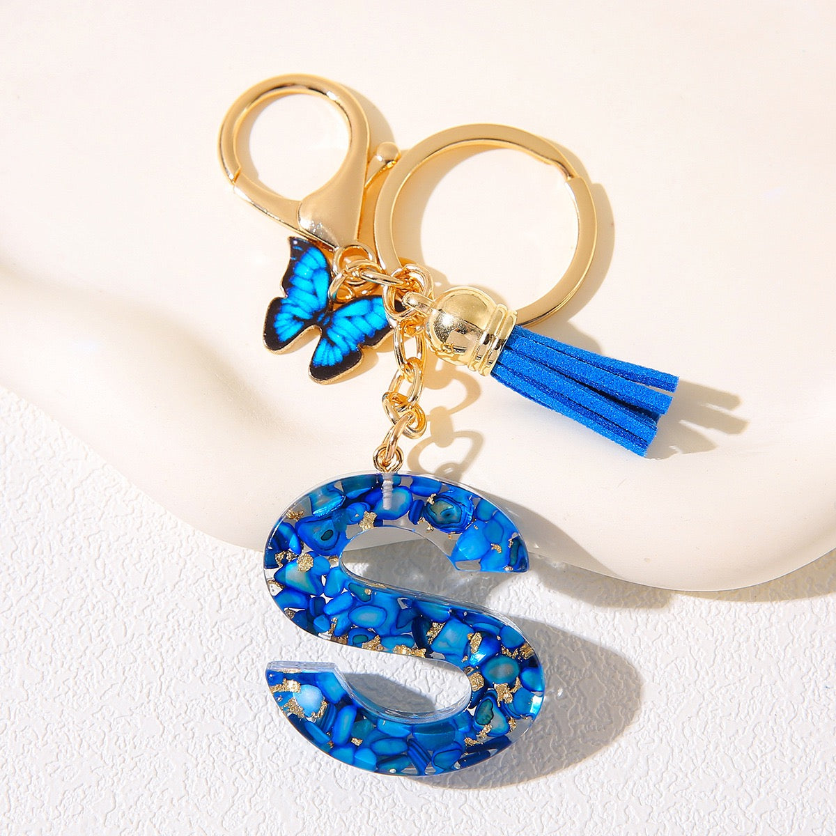 Blue Glitter Resin Initial Keychain – Butterfly & Tassel Charm