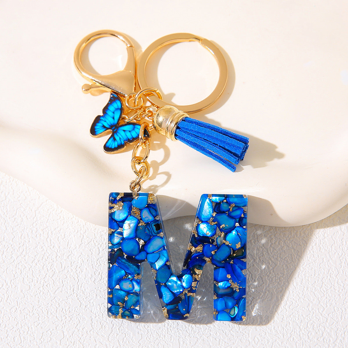 Blue Glitter Resin Initial Keychain – Butterfly & Tassel Charm