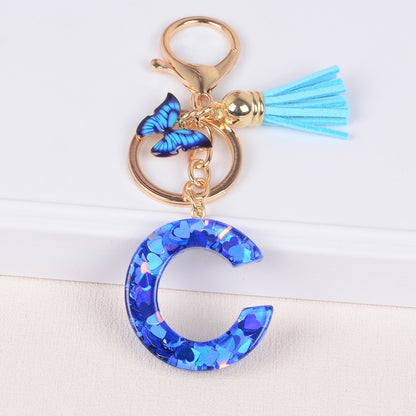 Blue Initial Letter Keychain with Butterfly & Tassel V Boutique Studio