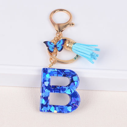 Blue Initial Letter Keychain with Butterfly & Tassel V Boutique Studio