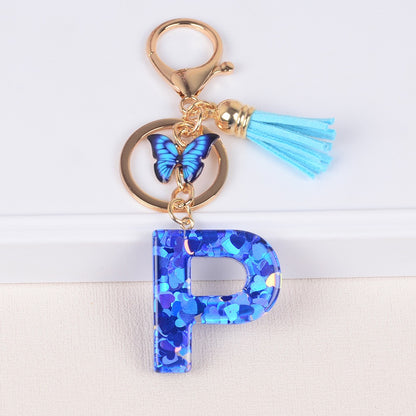 Blue Initial Letter Keychain with Butterfly & Tassel V Boutique Studio