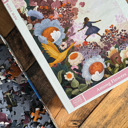 Among Flowers 500 Piece Jigsaw Puzzle New York Puzzle Company