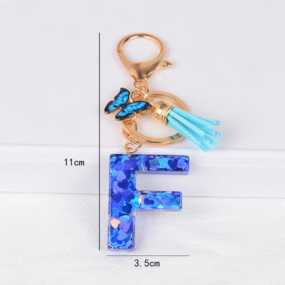 Blue Initial Letter Keychain with Butterfly & Tassel V Boutique Studio