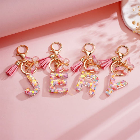Custom Pink Glitter Initial Keychain with Butterfly & Heart Charm V Boutique Studio