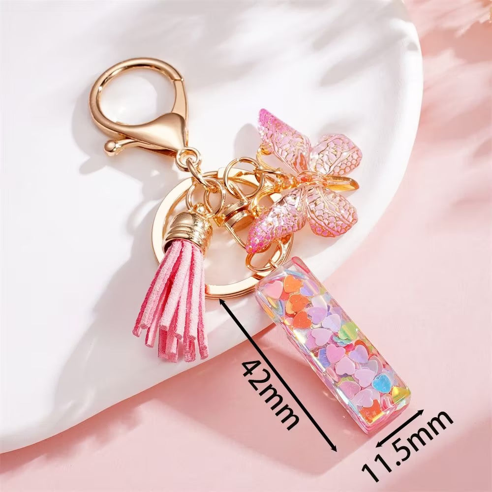 Custom Pink Glitter Initial Keychain with Butterfly & Heart Charm V Boutique Studio