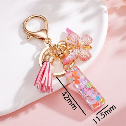 Custom Pink Glitter Initial Keychain with Butterfly & Heart Charm V Boutique Studio