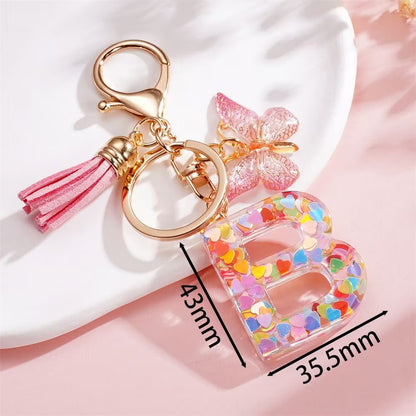 Custom Pink Glitter Initial Keychain with Butterfly & Heart Charm V Boutique Studio