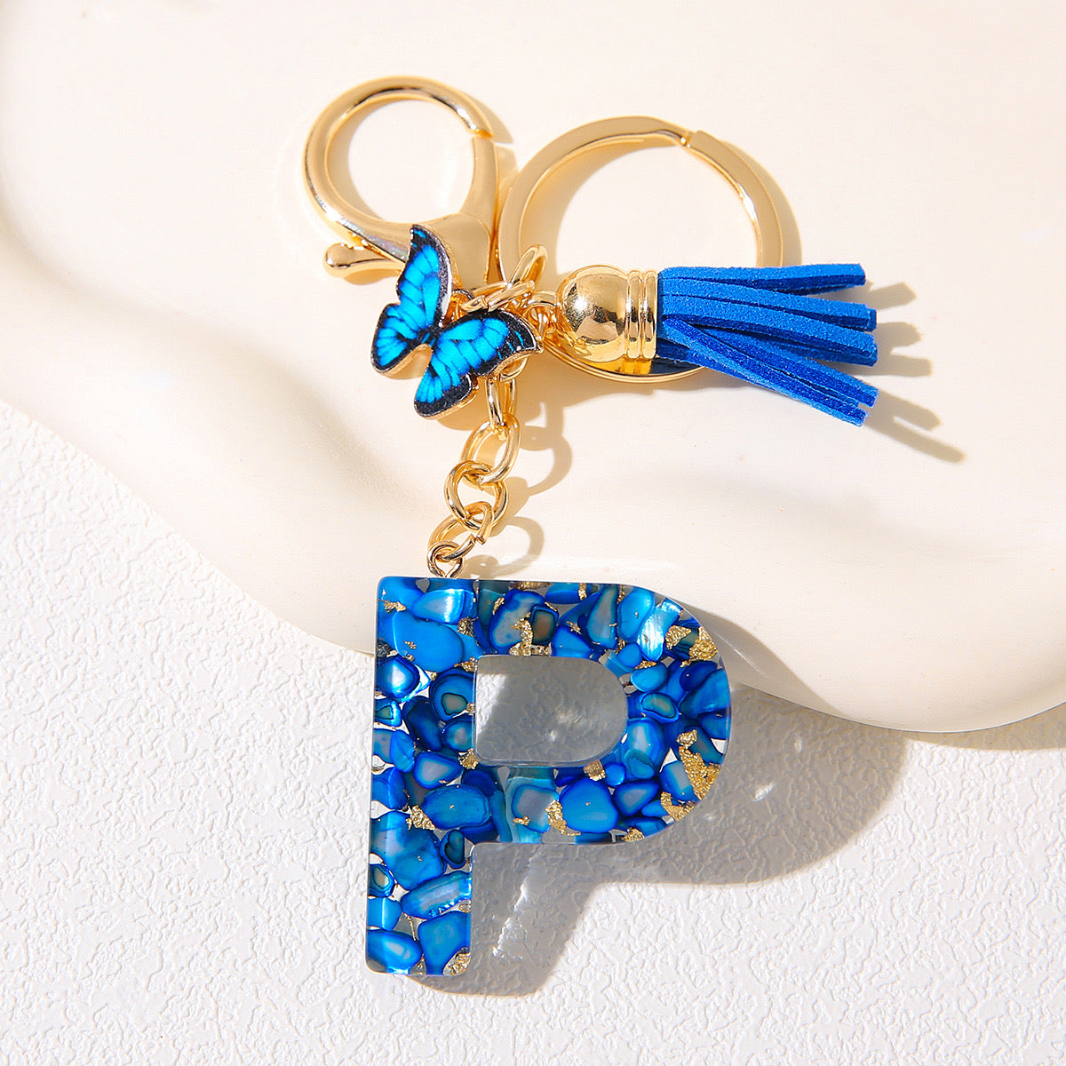 Blue Glitter Resin Initial Keychain – Butterfly & Tassel Charm