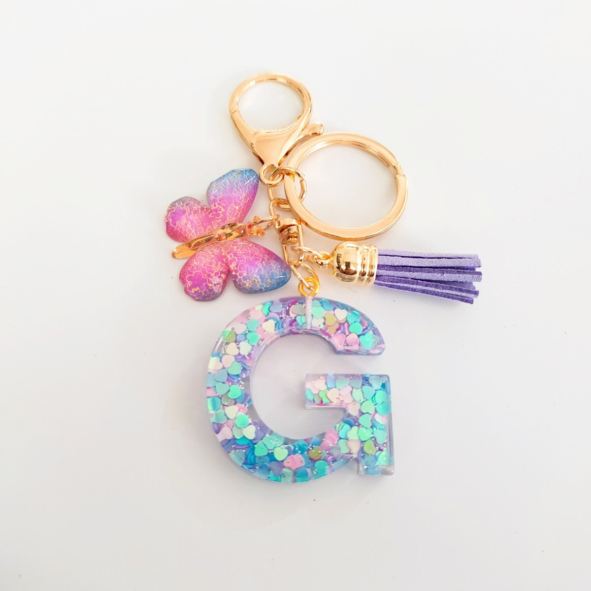 Glitter Resin Letter Keychain – Purple Tassel & Butterfly Charm