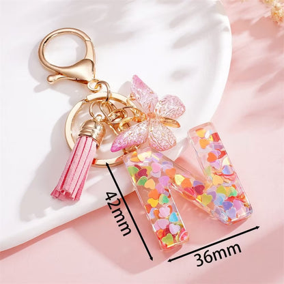 Custom Pink Glitter Initial Keychain with Butterfly & Heart Charm V Boutique Studio
