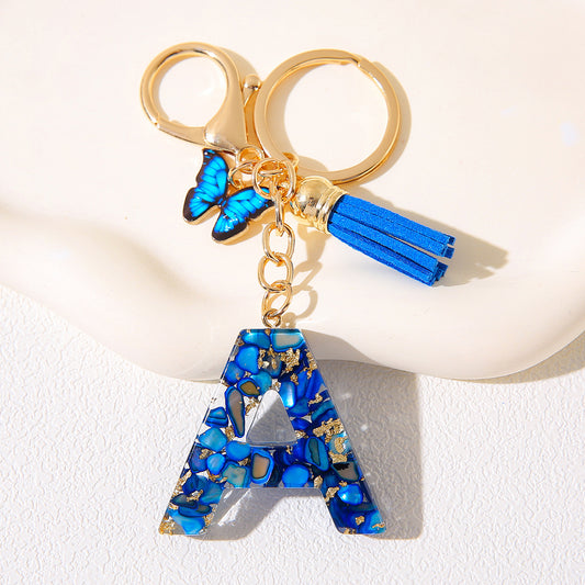 Blue Glitter Resin Initial Keychain – Butterfly & Tassel Charm