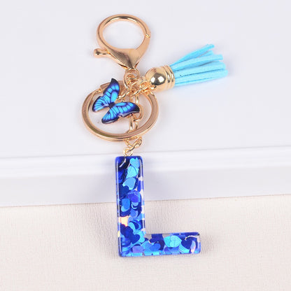Blue Initial Letter Keychain with Butterfly & Tassel V Boutique Studio