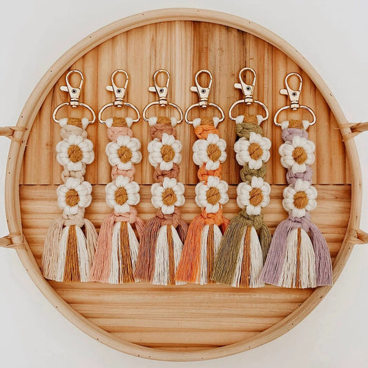 Handmade boho daisy macrame keychains with cotton tassels and flower design – perfect for bags or gifts
