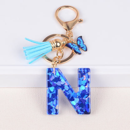Blue Initial Letter Keychain with Butterfly & Tassel V Boutique Studio
