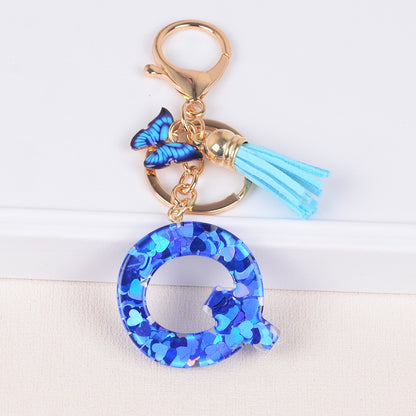 Blue Initial Letter Keychain with Butterfly & Tassel V Boutique Studio