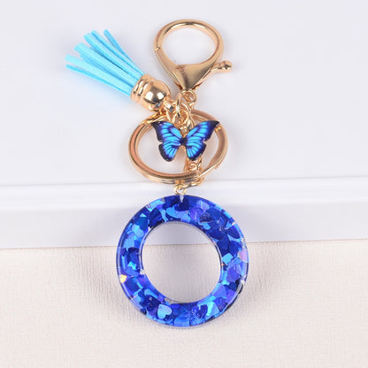 Blue Initial Letter Keychain with Butterfly & Tassel V Boutique Studio