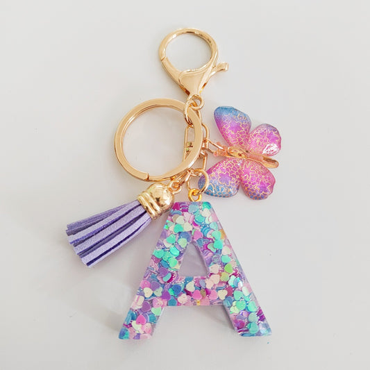 Glitter Resin Letter Keychain – Purple Tassel & Butterfly Charm