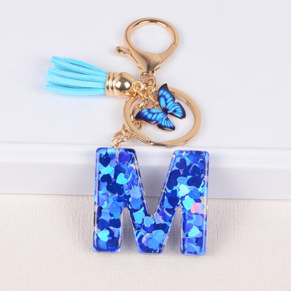 Blue Initial Letter Keychain with Butterfly & Tassel V Boutique Studio