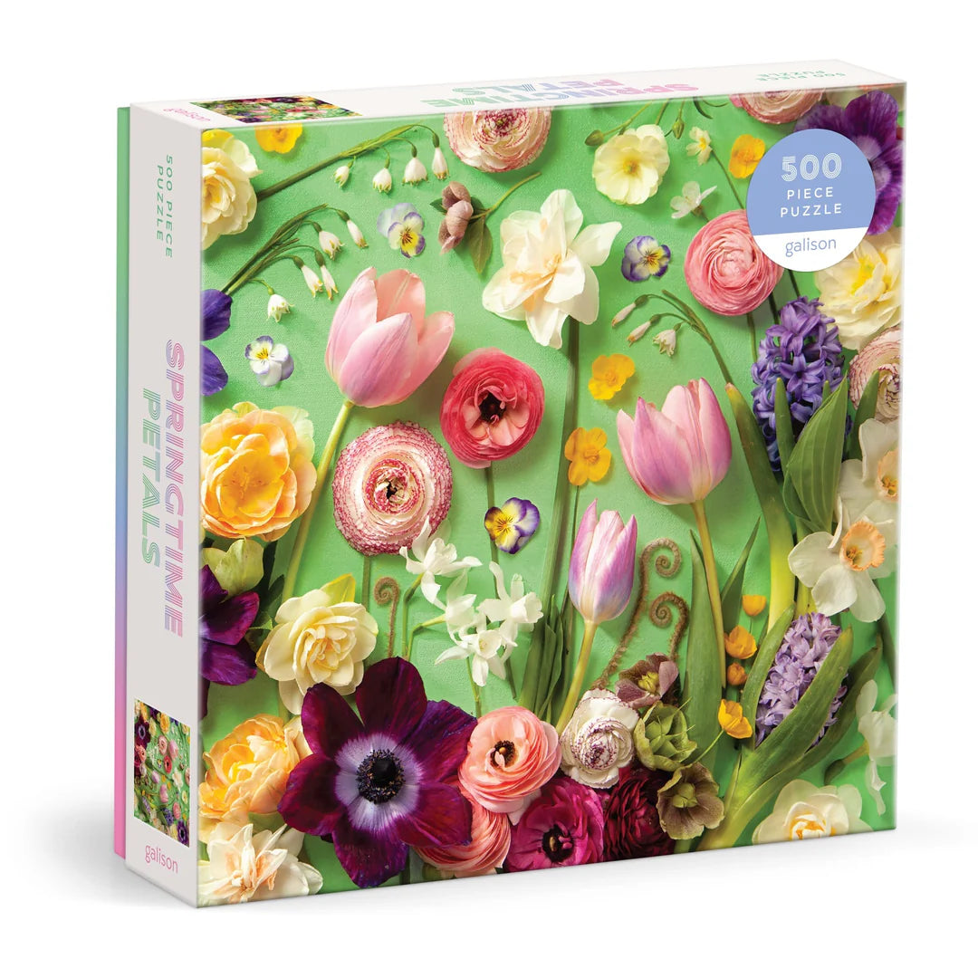 Springtime Petals 500-piece puzzle by Galison featuring a beautiful arrangement of colorful spring flowers like tulips and daffodils on a soft green background.